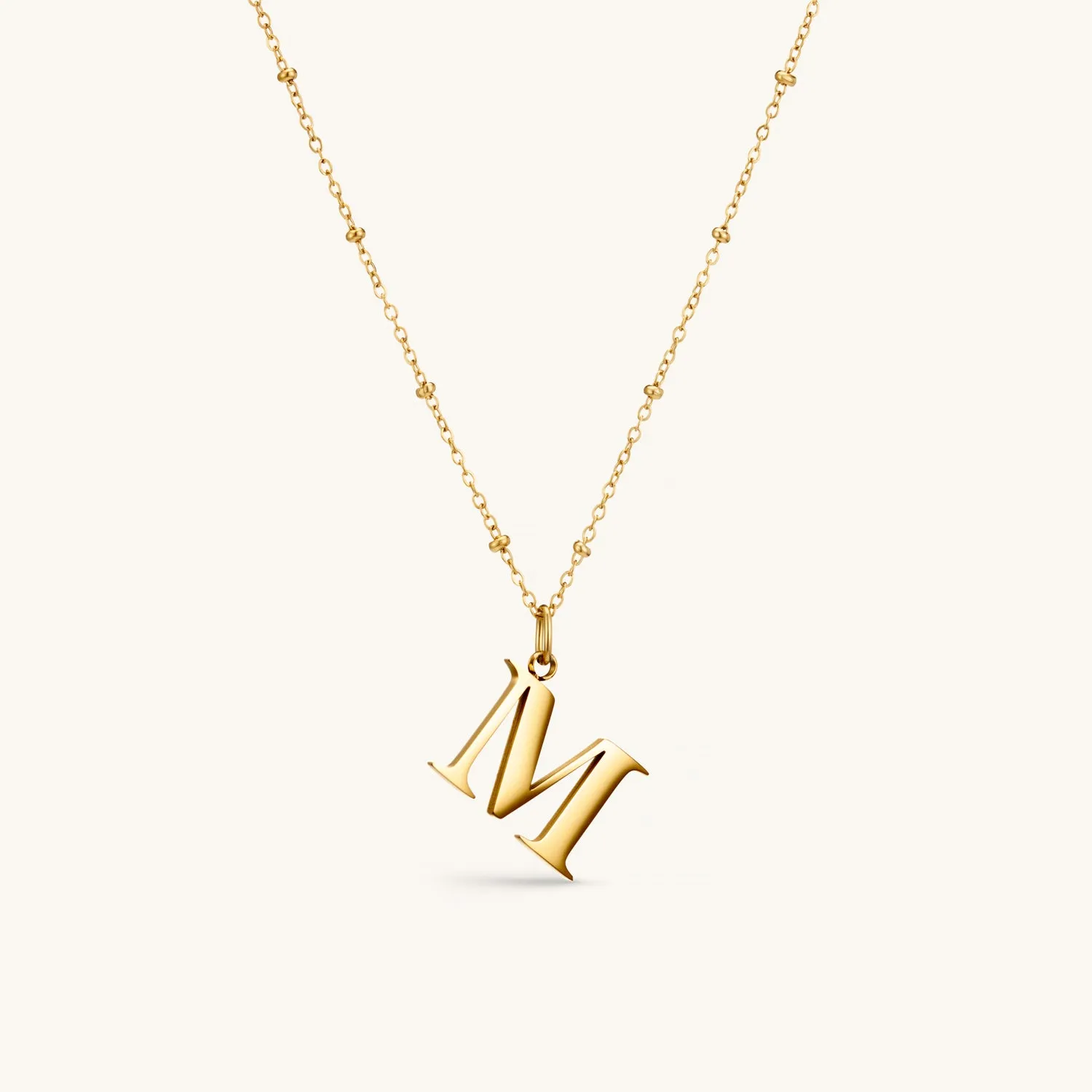 M Initial Pendant Necklace In Gold